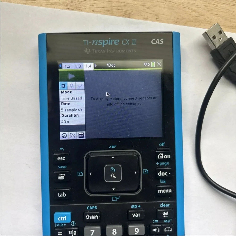 Texas Instruments TI Nspire CX II CAS Graphing Calculator with charger USB cable